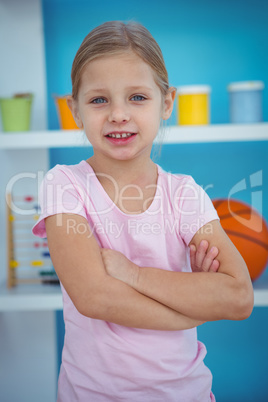 Cute girl with arms crossed