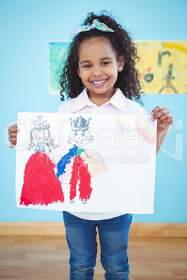 Cute girl showing her drawing