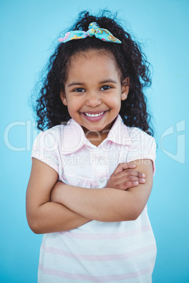 Cute girl with arms crossed