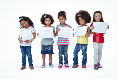 Cute girls showing sheets of paper