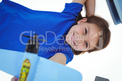 Cute girl playing with airplane