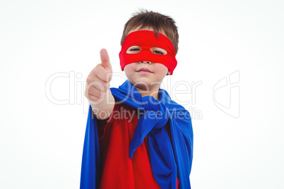 Masked boy pretending to be superhero