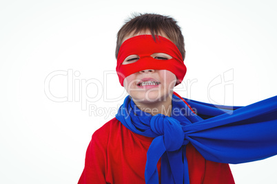 Masked boy pretending to be superhero