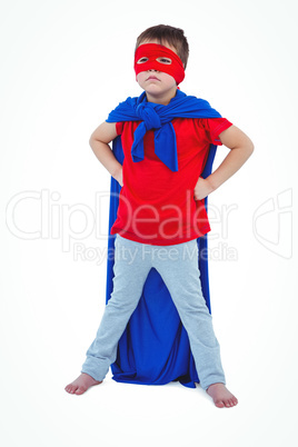 Masked boy pretending to be superhero