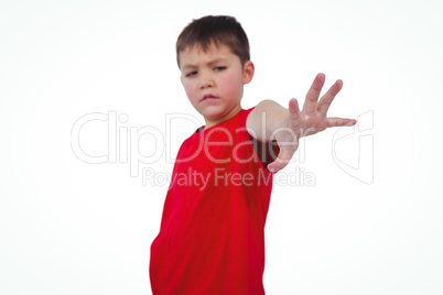 Boy holding his hand on the camera