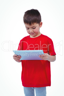 Standing boy using tablet