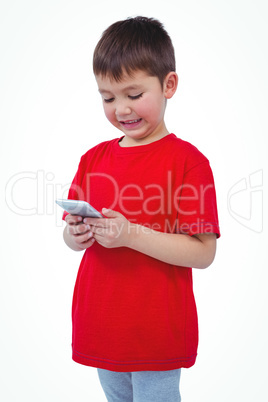 Standing boy using smartphone