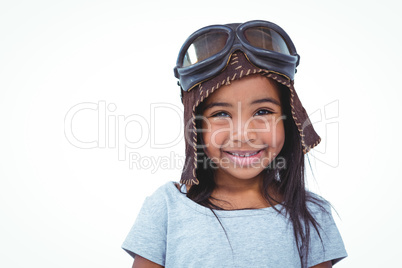 Smiling girl pretending to be pilot