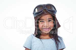 Smiling girl pretending to be pilot