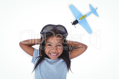 Smiling girl laying on the floor