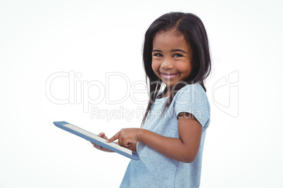 Standing girl using tablet and smiling at camera