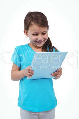 Standing girl using tablet