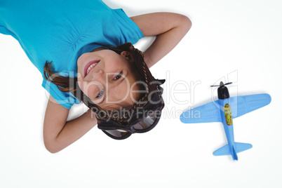 Smiling girl laying on the floor