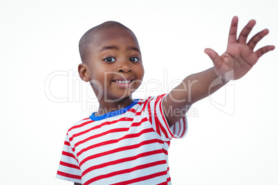 Boy holding his hand on the camera