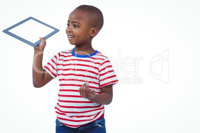 Standing boy holding tablet