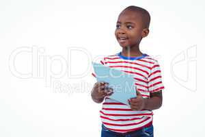 Standing boy holding tablet