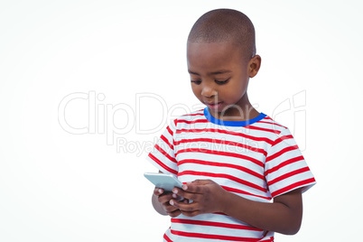 Standing boy using smartphone