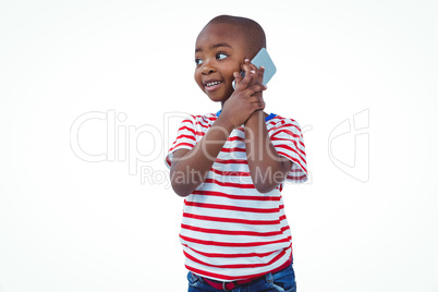 Standing boy on a phone call