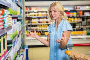 Confused woman doesnt know what to buy