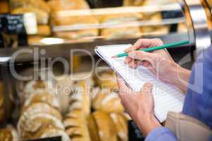 Woman checking her shopping list