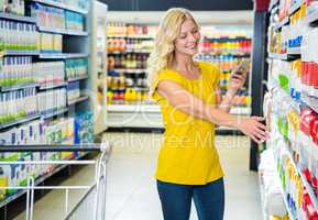 Woman buy products and texting