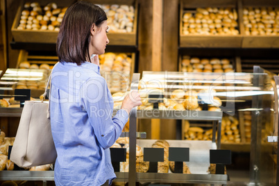 Beautiful woman choosing her bread Beautiful woman choosing her bread