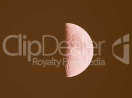 Retro looking First quarter pink moon