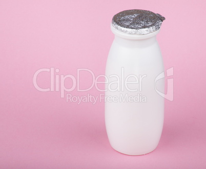 white bottle on pink background white bottle on pink background