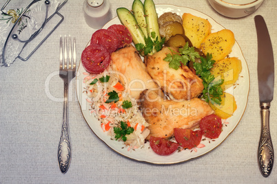 Baked fish and vegetables . The view from the top.