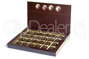 An open box of chocolates on a white background.