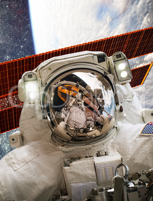 International Space Station and astronaut.