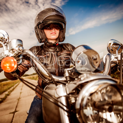 Biker girl on a motorcycle