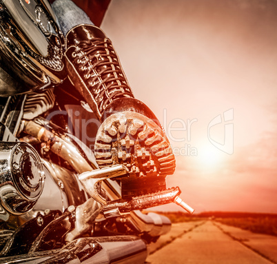 Biker girl riding on a motorcycle