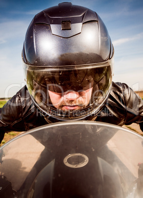 Biker racing on the road