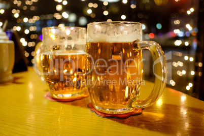 Two cups of beer in a pub