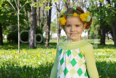 child with flower wreath on head
