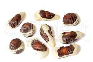 Chocolates of a various form on a white background.