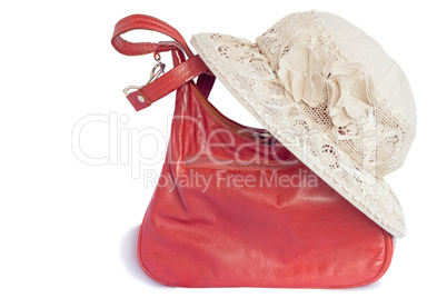 Female summer hat for protection against the sun and a bag on a