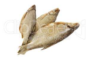 Salted and dried river fish on a white background.