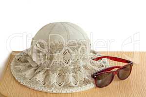 Female summer hat for protection against the sun on a white back
