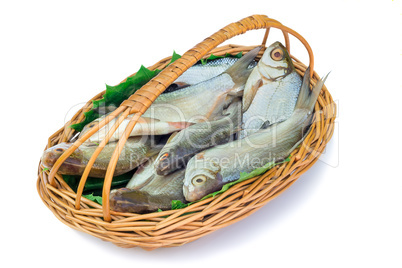 Wattled basket with hooked fish on a white background.