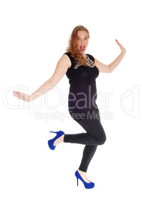 Dancing woman in black tights.