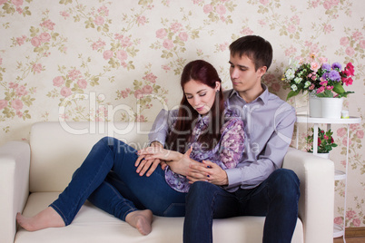 Couple sitting on the sofa together