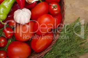 Fresh tomatoes in a wicker basket