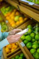 Close up view of a woman using her smartphone