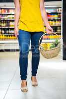 Cropped image of woman holding basket