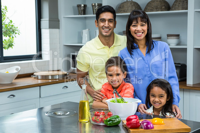 Portrait of happy family in the kitchen