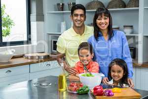 Portrait of happy family in the kitchen