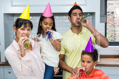 Happy family partying in the kitchen