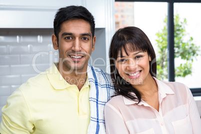 Smiling couple in the kitchen